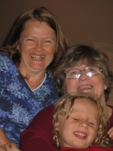 Me (top left) with my mother and son.